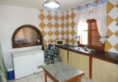 Отдельно стоящий дом с участком на продажу в городе Órgiva. Фото