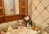 Отдельно стоящий дом с участком на продажу в городе Льорет де Мар. Фото