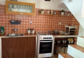 Отдельно стоящий дом с участком на продажу в городе Аликанте. Фото