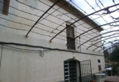 Фермерский дом с участком на продажу в городе Tortosa. Фото