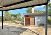 Отдельно стоящий дом с участком на продажу в городе Tortosa. Фото
