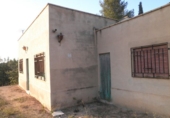 Отдельно стоящий дом с участком на продажу в городе Tortosa. Фото