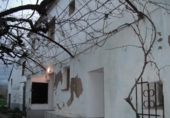 Дом с участком на продажу в городе Tortosa. Фото