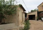 Дом с участком на продажу в городе Tortosa. Фото