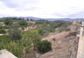 Отдельно стоящий дом с участком на продажу в городе Tortosa. Фото