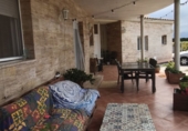 Отдельно стоящий дом с участком на продажу в городе Tortosa. Фото