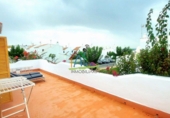 Chalet adosado con terreno en venta en Matalascañas ref: TR51850 foto