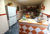 Таунхаус с участком на продажу в городе Cala. Фото