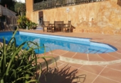 Дом с участком на продажу в городе el Vendrell. Фото