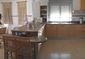 Отдельно стоящий дом с участком на продажу в городе Molina de Segura. Фото