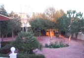 Отдельно стоящий дом с участком на продажу в городе Molina de Segura. Фото