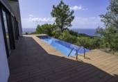 Отдельно стоящий дом с участком на продажу в городе Tossa de Mar. Фото