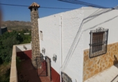 Дом с участком на продажу в городе Lucainena de las Torres Фото