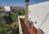 Дом с участком на продажу в городе Lucainena de las Torres Фото