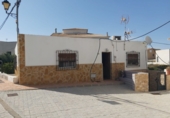 Дом с участком на продажу в городе Lucainena de las Torres Фото