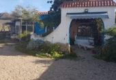 Загородный дом с участком на продажу в городе Cabo de Gata. Фото