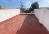 Дом с участком на продажу в городе Tomares. Фото
