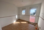 Дом с участком на продажу в городе Tomares. Фото