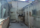 Дом с участком на продажу в городе Касерес. Фото