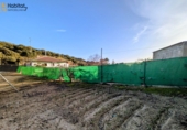 Загородный дом с участком на продажу в городе Loja. Фото