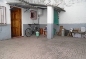Дом с участком на продажу в городе Loja. Фото