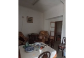 Участок с постройкой на продажу в городе Loja. Фото