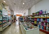 Участок с постройкой на продажу в городе Loja. Фото