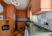 Дом с участком на продажу в городе Loja. Фото