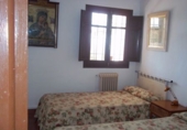 Фермерский дом с участком на продажу в городе Loja. Фото