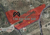 Городская земля под застройку на продажу у города Olvera. Фото