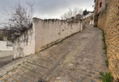 Дом с участком на продажу в городе Setenil de las Bodegas. Фото
