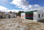Загородный дом с участком на продажу в городе Cúllar. Фото