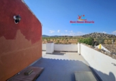 Загородный дом с участком на продажу в городе Cúllar. Фото
