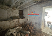 Загородный дом с участком на продажу в городе Cúllar. Фото