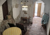 Дом с участком на продажу в городе Castell de Ferro. Фото