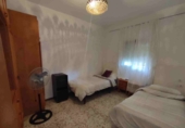 Отдельно стоящий дом с участком на продажу в городе Olivares. Фото
