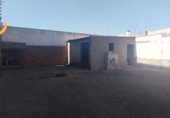 Участок с постройкой на продажу в городе Cartaya. Фото
