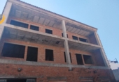 Участок с постройкой на продажу в городе Cartaya. Фото