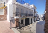 Участок с постройкой на продажу в городе Cartaya. Фото