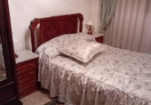 Дом с участком на продажу в городе Понферрада Фото