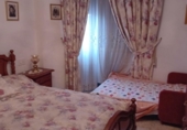 Дом с участком на продажу в городе Понферрада Фото