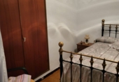 Дом с участком на продажу в городе Гранха-де-Торреермоса. Фото