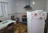 Дом с участком на продажу в городе Гранха-де-Торреермоса. Фото