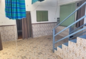 Дом с участком на продажу в городе Гранха-де-Торреермоса. Фото