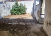 Дом с участком на продажу в городе Гранха-де-Торреермоса. Фото