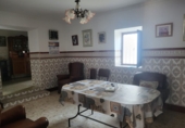 Дом с участком на продажу в городе Azuaga. Фото