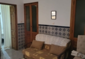 Дом с участком на продажу в городе Гранха-де-Торреермоса. Фото