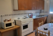 Дом с участком на продажу в городе Гранха-де-Торреермоса. Фото