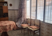 Дом с участком на продажу в городе Гранха-де-Торреермоса. Фото