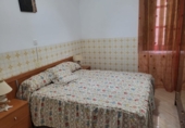Дом с участком на продажу в городе Гранха-де-Торреермоса. Фото